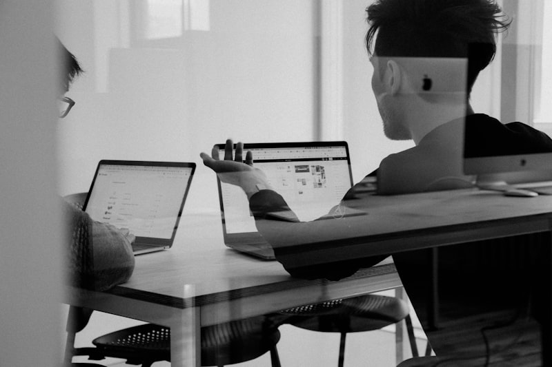 Learner reviewing an interactive skill-verification dashboard on a laptop with progress charts and lesson modules visible